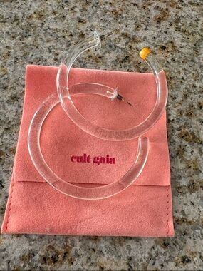 cult gaia Clear Lucite Hoop Earrings with Pink Suede Pouch and Yellow Tip